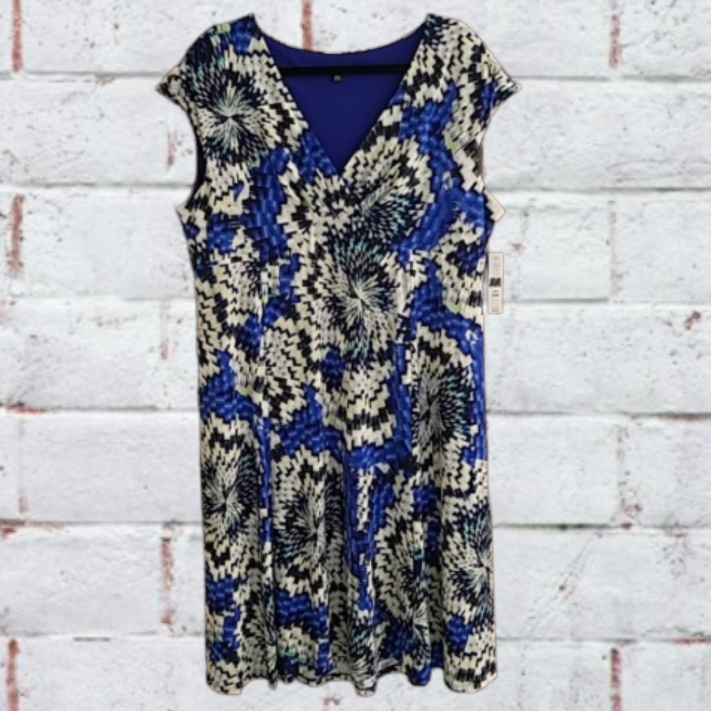 NOT AVAILABLE. Glamour surplice flowy mini dress, bright blue pattern NWT